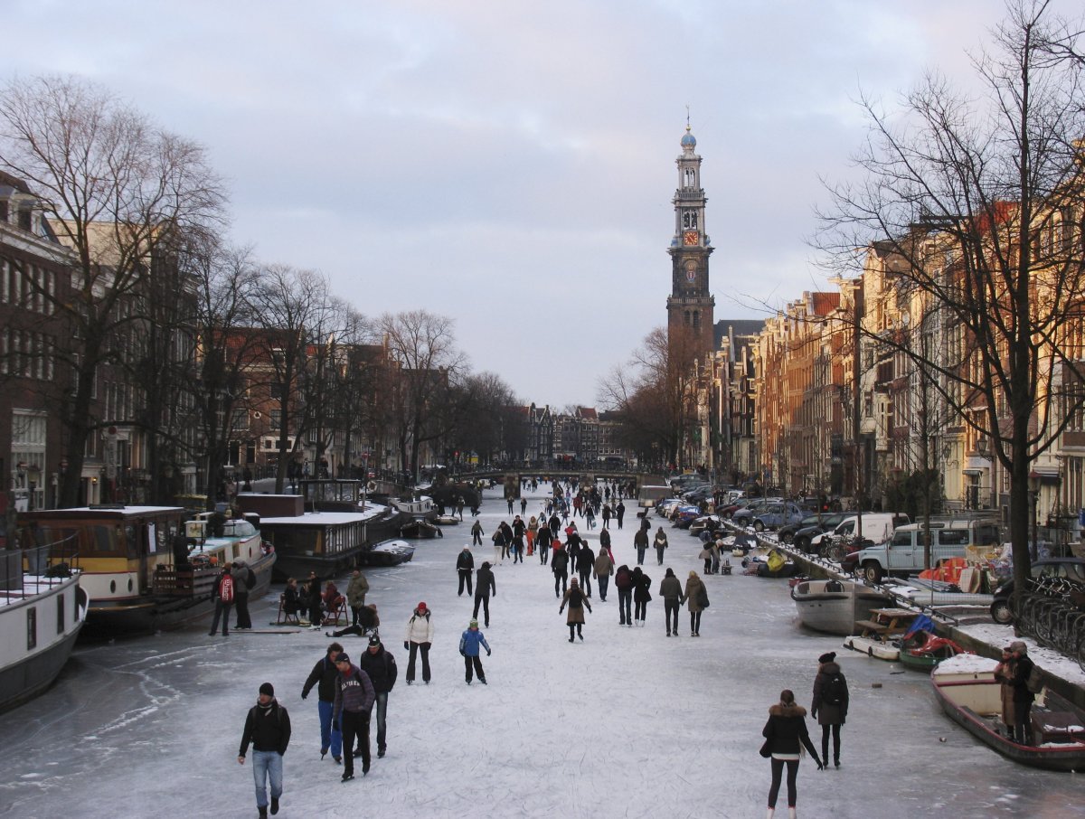 Deep Freeze Turns Amsterdam Canals Into Ice Skating Wonderland (PHOTOS