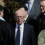 Rupert Murdoch (C), Chairman and CEO of
