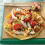 Hierba Fresca Y Salsa de Tomate Con Queso Ahumado