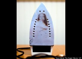 Electric Iron With Image of Jesus -- Nov. 27