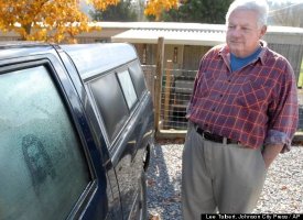 Jim Stevens Next to Truck With Jesus Image -- Nov. 2