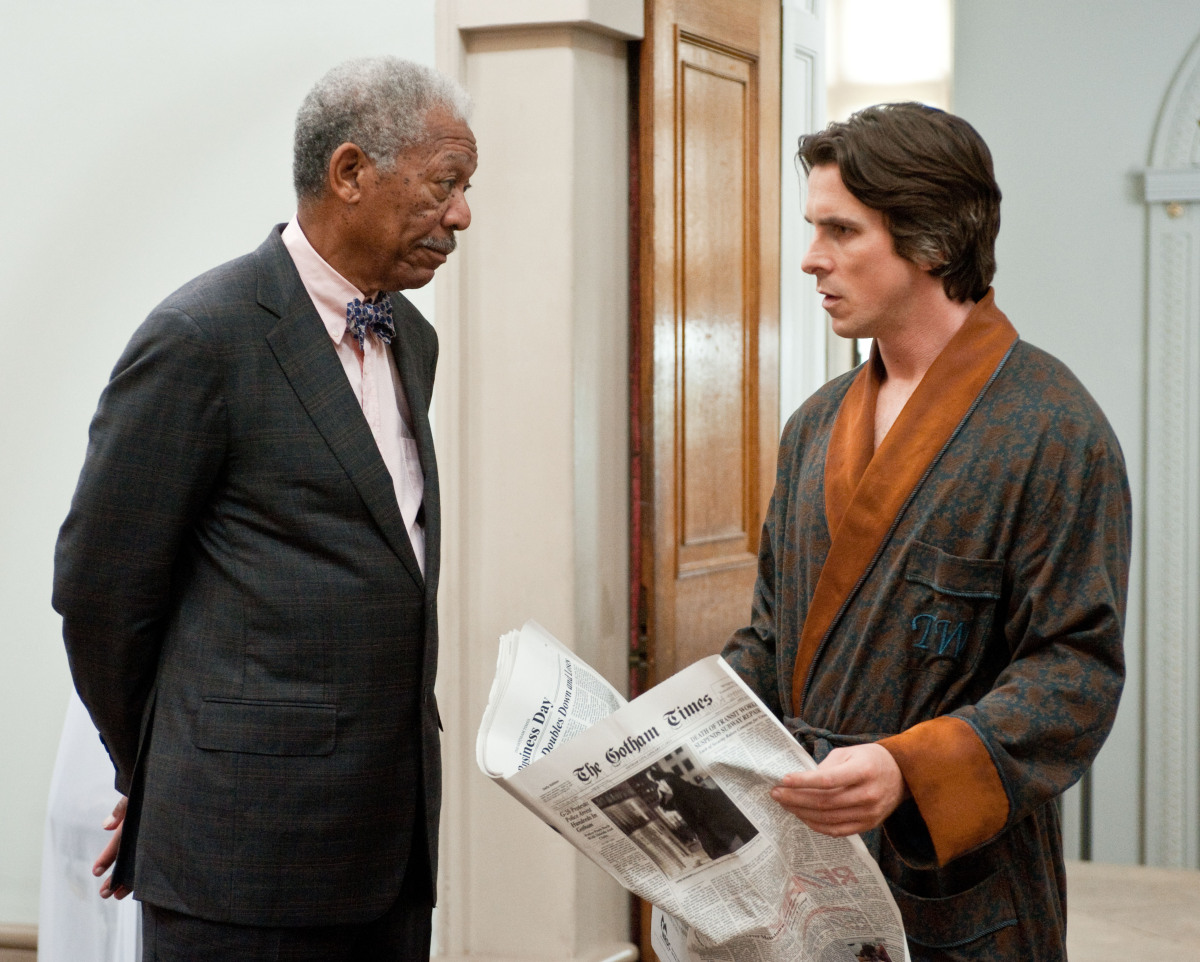 Morgan Freeman as Lucius Fox, left, and Christian Bale as Bruce Wayne in a scene from the action thriller "The Dark Knight Rises." (Photo credit: AP Photo/Warner Bros. Pictures, Ron Phillips)