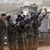 Israeli Soldiers Check Their Guns