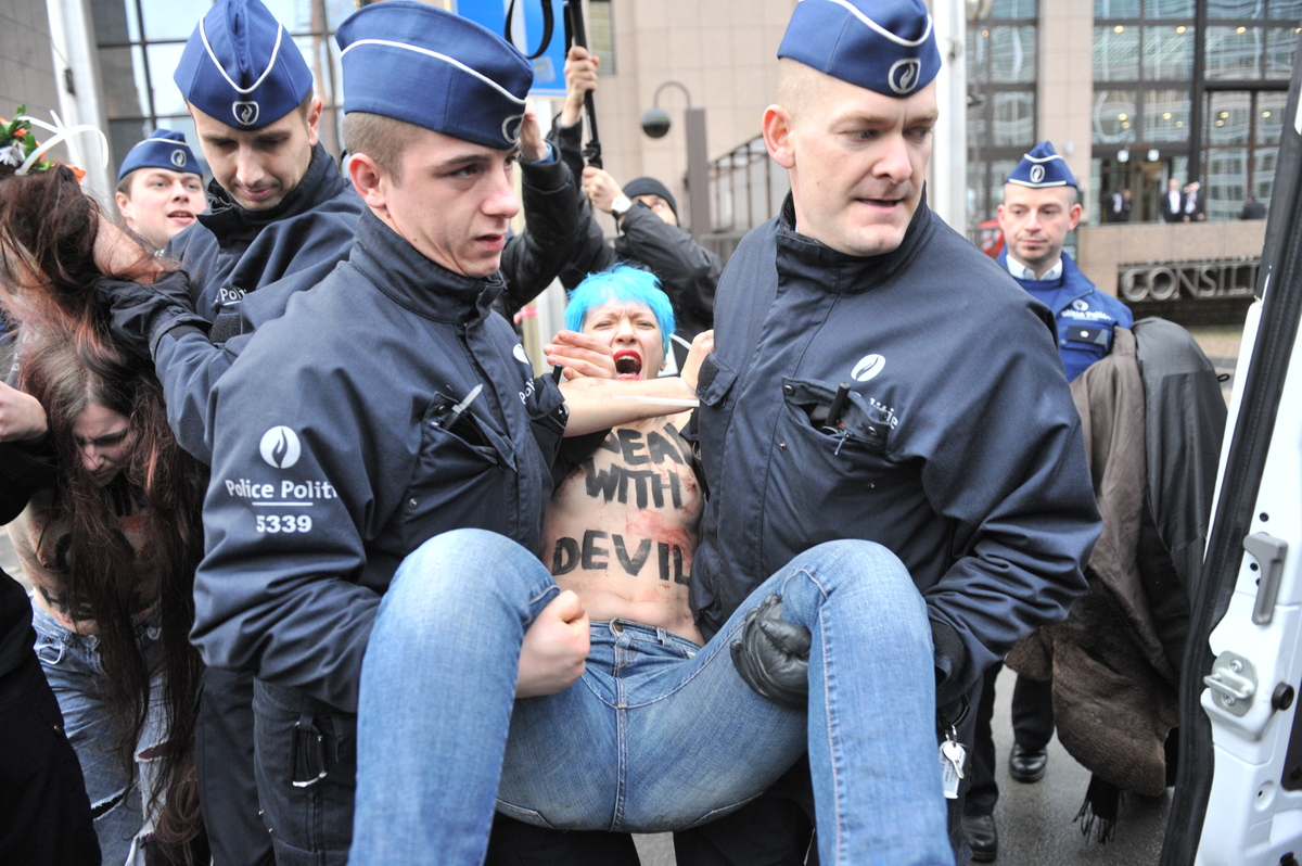  Activists Stage Topless Protest Against Putin