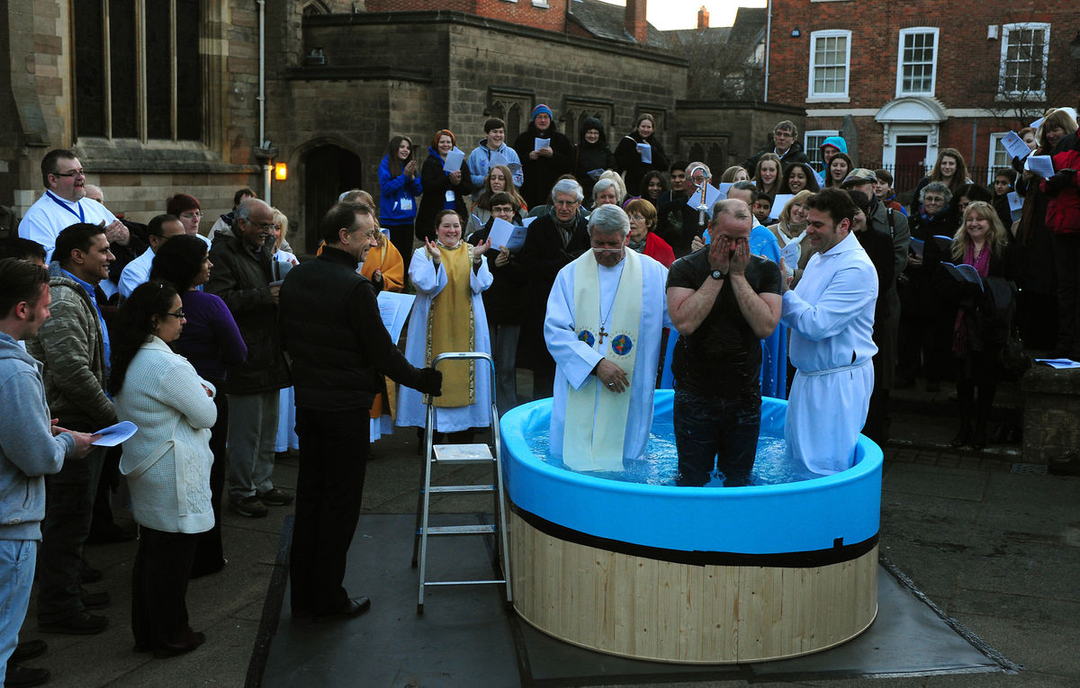 Baptism Of Ice As Christians Are Submerged In Chilly Conditions