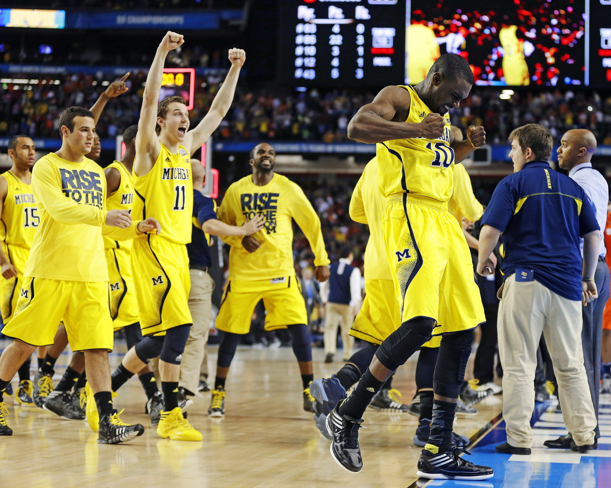 Michigan Louisville Reach NCAA Basketball National Championship Game