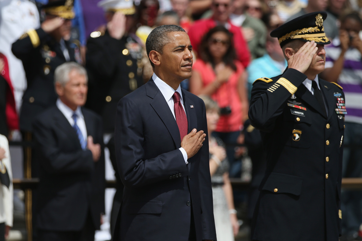 Obama At Arlington National Cemetery: President Honors Troops On.