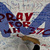 A Malaysia Airlines employee writes a message for passengers onboard flight MH370 at Kuala Lumpur International Airport 