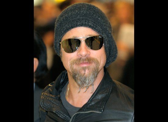 brad pitt beard beads. Pitt is in Tokyo to attend the