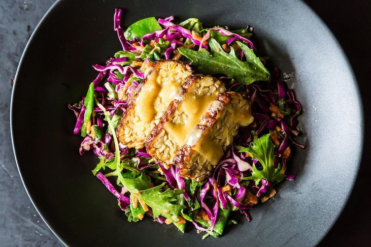 Snow Pea, Cabbage And Mizuna Salad With Marinated And Seared Tempeh. Image: Food52