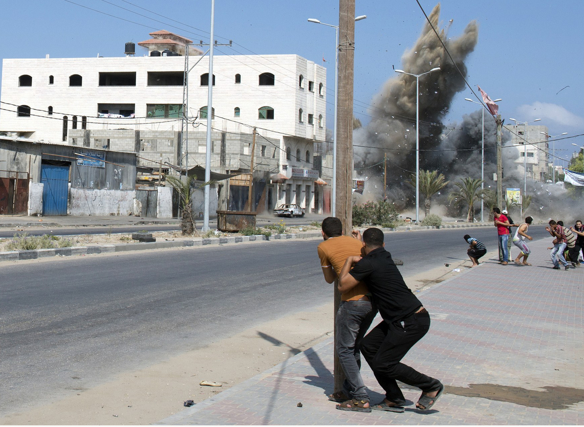 Dramatic Pictures Show Israeli Bomb Striking Gaza | HuffPost UK