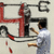 Graffiti artists draw the pictures of killed 14 Yemeni soldiers on the walls of Sanaa