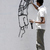 Graffiti artists draw the pictures of killed 14 Yemeni soldiers on the walls of Sanaa