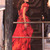 Amal Alamuddin, con un vestido rojo de Alexander McQueen en su despedida de soltera en Venecia