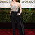 Emma Stone in Lanvin jumpsuit and Chanel makeup