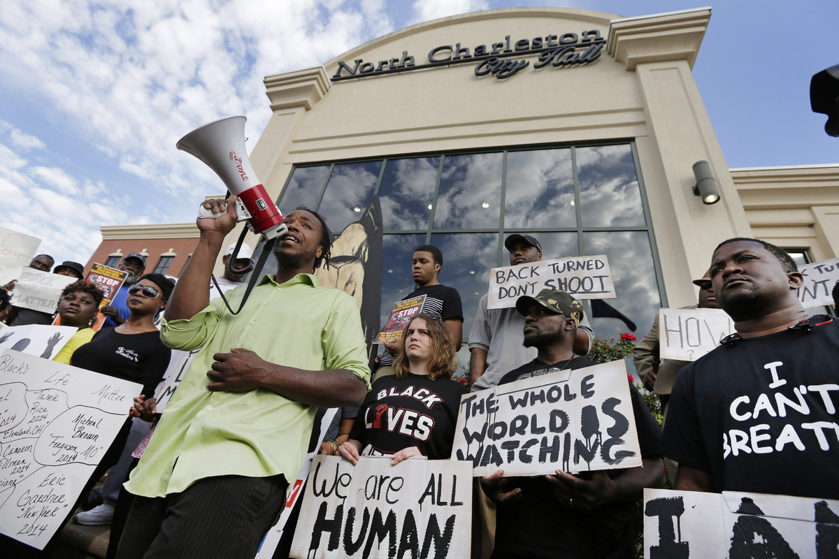 'We Are One' Protesters Decry Racism After South Carolina Officer