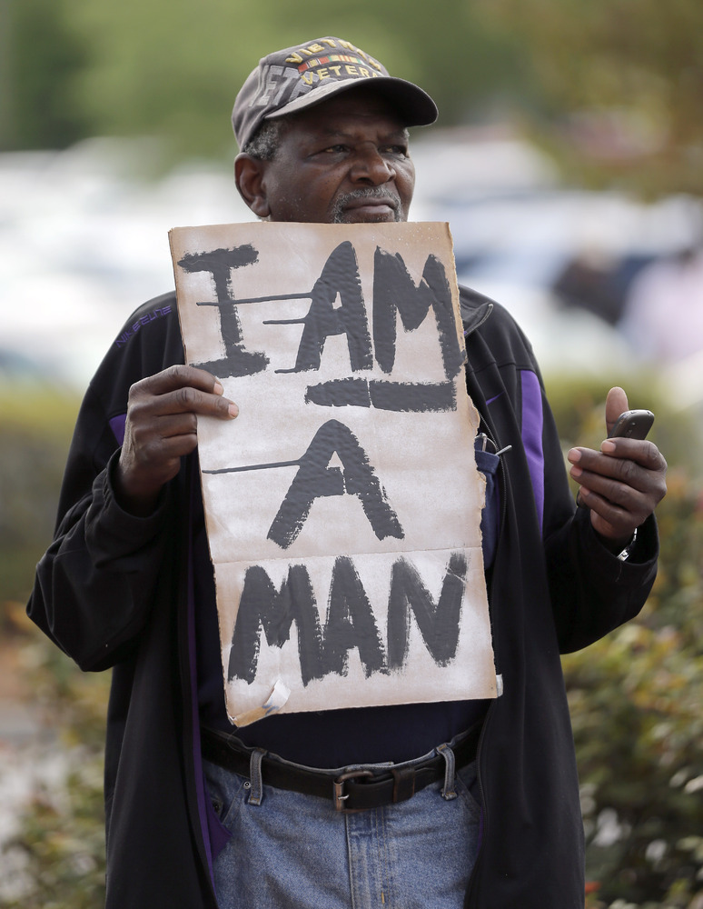 'We Are One' Protesters Decry Racism After South Carolina Officer