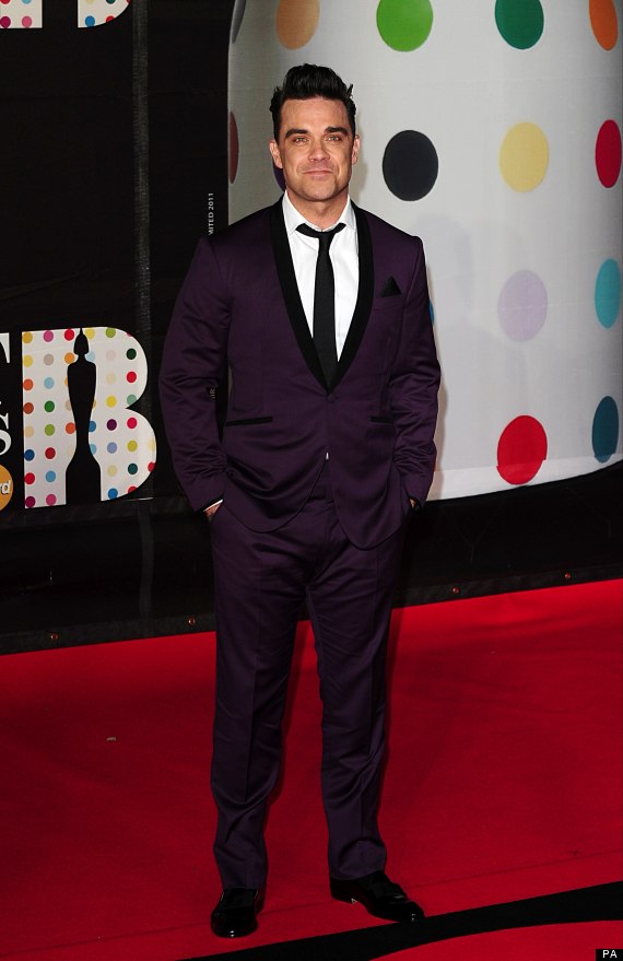 robbie williams carpet awards brit loss weight suit plum singer brits result shows coloured svelte checks notes looking