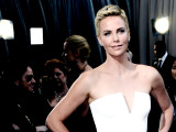 Charlize Theron Helps Security Guard Who Suffered...