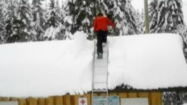 Man climbing roof
