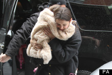 Heavy Lifting: Katie Holmes Carries Six-Year-Old Suri In New York