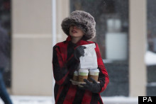 Anne Hathaway, Your Furry Hat/Picnic Blanket Combo Doesn’t Fool Us