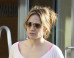 Jennifer Lopez Flashes Pink Bra In See-Through Shirt
