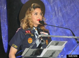 Why's Madonna Dressed As A Boy Scout?