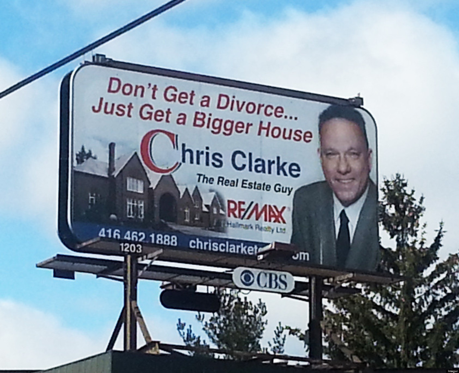 Funny Billboard Realtor Suggests Getting A Bigger House Instead Of A