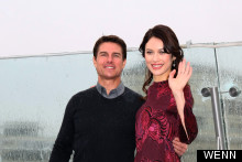 Shift It: Olga Kurylenko Steals Tom Cruise's Thunder At Oblivion Photo Call
