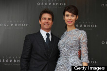 Blue Belle! Olga Kurylenko & Tom Cruise Touch Down In Moscow For Oblivion Premiere