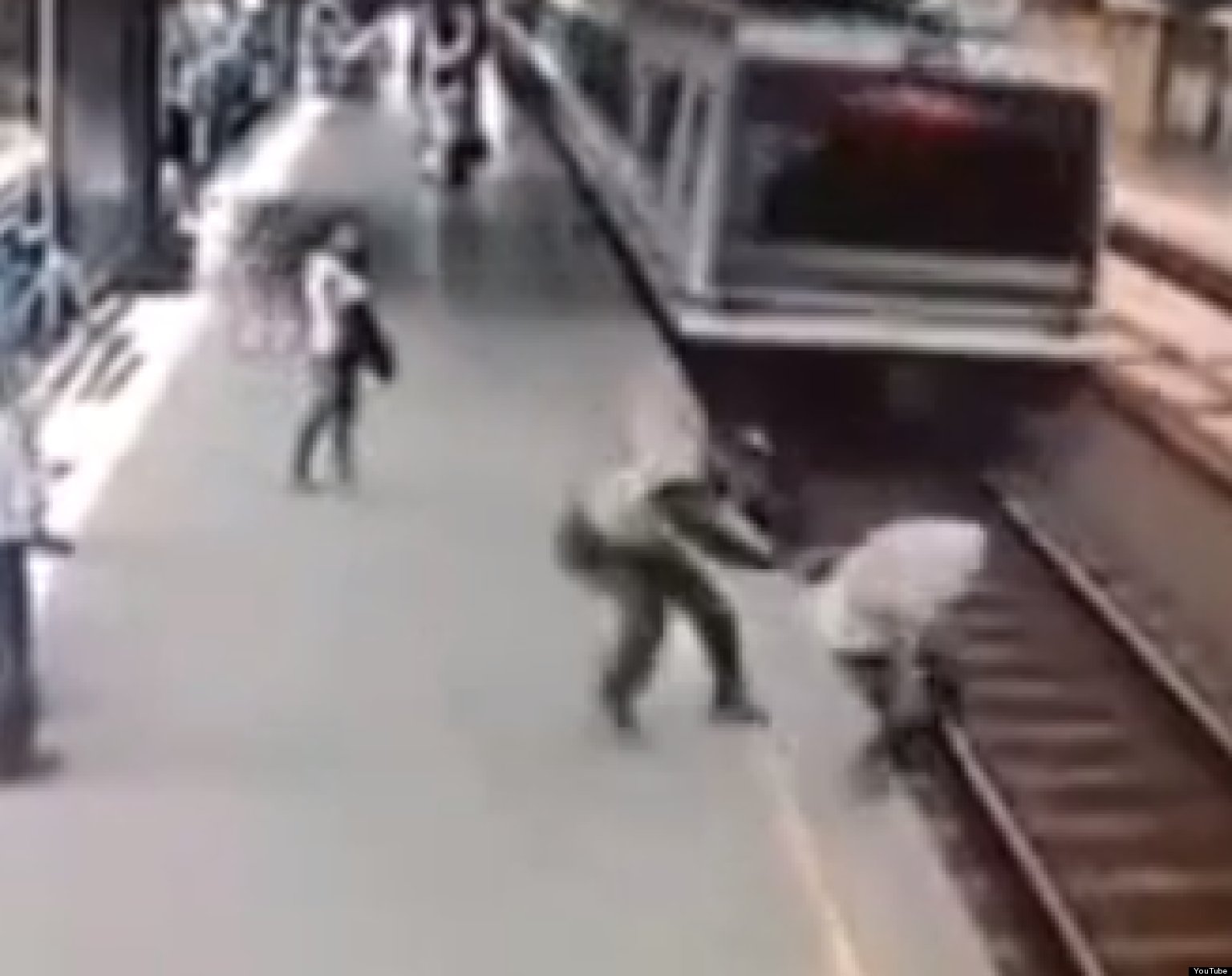 Police Officer Saves Man From Being Hit By Train (VIDEO) | HuffPost