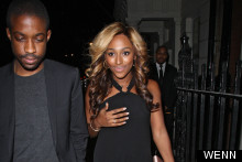 Alexandra Burke Shows Off Party Pins In Tiny LBD