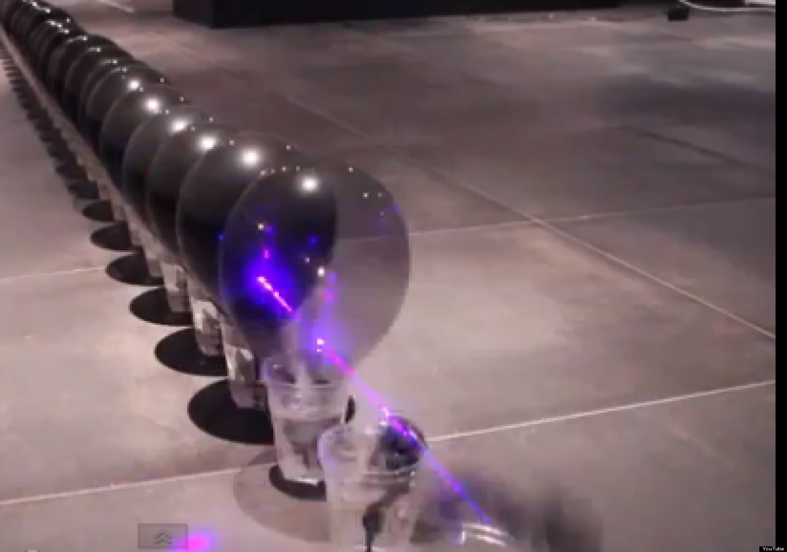 Powerful Laser Pops 100 Balloons (VIDEO) The Huffington Post
