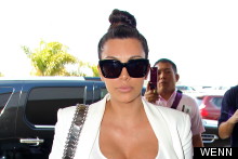 Kim And Khloe Kardashian Go For Yin-Yang Style In LA