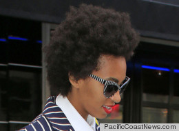 PHOTOS: Solange Exposes Bra In Peekabo Suit