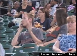 WATCH: Woman Pours Drink On Boyfriend After He Ignores Her On 'Kiss Cam'