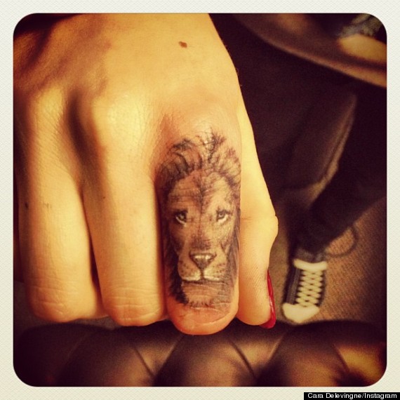 Lion Tattoo On Finger