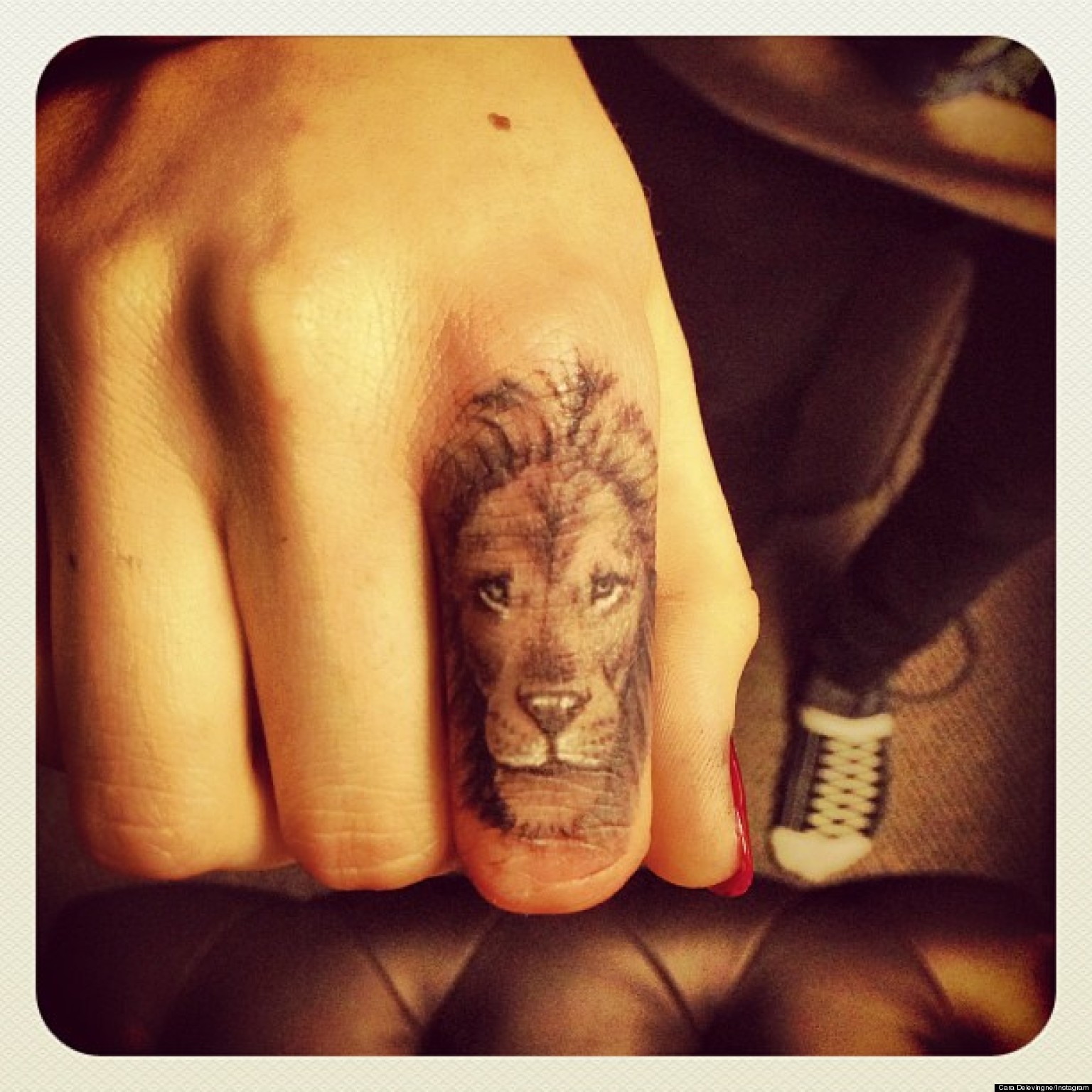 CARA-DELEVINGNE-NEW-LION-TATTOO-facebook.jpg