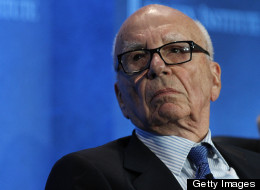 Sun Editor Charged In Murdoch Scandal