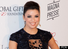 Eva Longoria Shows Odd Bit Of Skin On Red Carpet