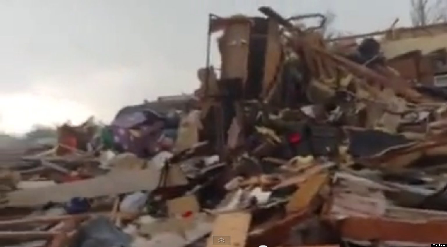 WATCH: Family Emerges From Storm Cellar To Find Neighborhood In Ruins