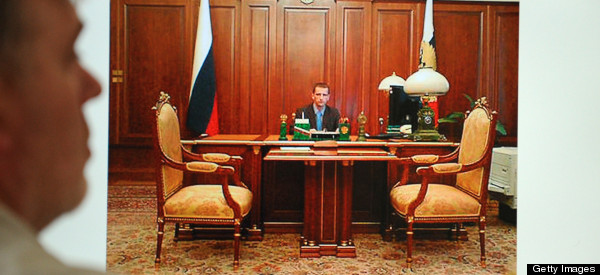 PHOTO: Russian Officer 'Posed At Putin's Desk To Impress Girls'