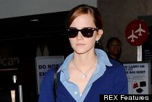 Cardigan Cool: Emma Watson's Blue And White jet-Setter Style