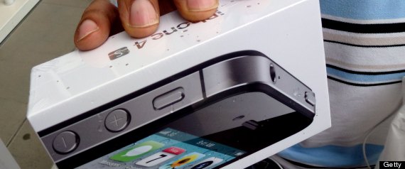 ... owners of the iPhone 4 and iPhone 4S. Here, a person holds an iPhone ... owners of the iPhone 4 and iPhone 4S. Here, a person holds an iPhone