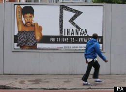 Topless Rihanna Gets Covered Up