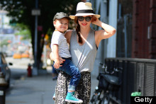 Summer In The City: Miranda Kerr Is Boho Chic In Floaty Maxi Skirt And Trilby