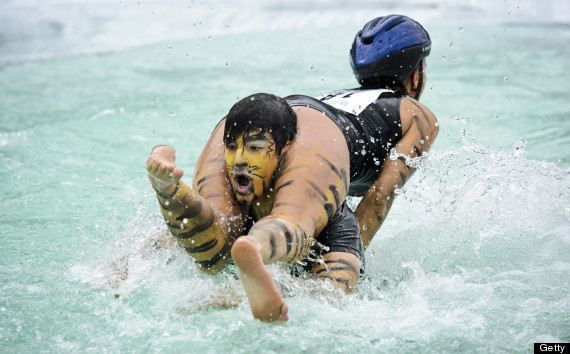 Wife-Carrying Possibly The Most Bizarre of Couples Activities? (PICTURES)