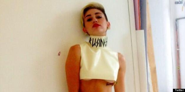 Miley Cyrus Flashes Underboob Abs In Crop Top Wants Us To Know Shes A Business Lady Photo 