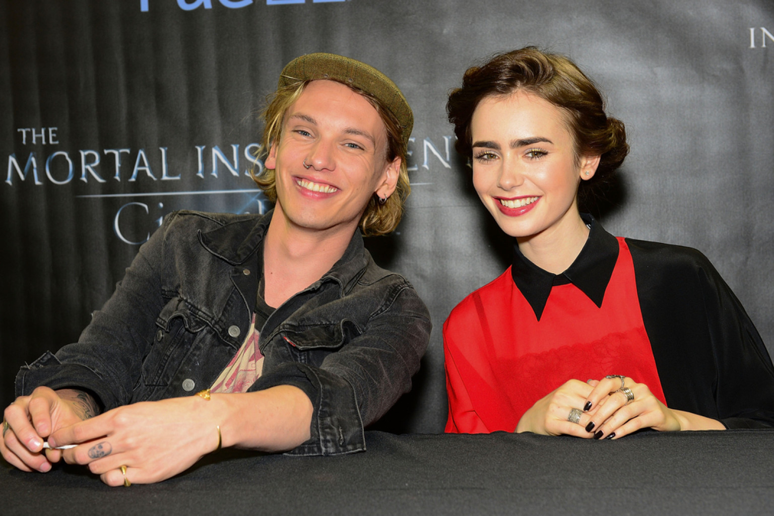 jamie campbell bower dating lily collins